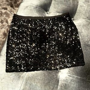 Black sequence mini skirt with lining
